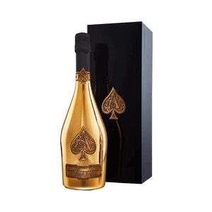 Empty Armand De Brignac Brut Gold bottle and box